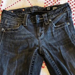 Miss Me distressed black jeans.